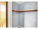 Closet with wooden trim and wooden shelving for optimal storage solutions and organization within the bedroom space at 333 E Waterbury Rd, Indianapolis, IN 46227