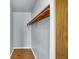 Empty closet featuring a wooden shelf and flooring at 333 E Waterbury Rd, Indianapolis, IN 46227