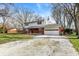 Charming home with a spacious driveway and a well-maintained yard, perfect for outdoor activities at 333 E Waterbury Rd, Indianapolis, IN 46227