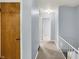 Upstairs hallway leading to multiple bedrooms and bathroom at 333 E Waterbury Rd, Indianapolis, IN 46227