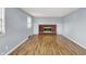 Living room with wood floor and fireplace at 333 E Waterbury Rd, Indianapolis, IN 46227