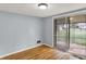 Bright living room with sliding glass doors and hardwood flooring at 333 E Waterbury Rd, Indianapolis, IN 46227