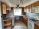 Updated kitchen showcasing ample storage, counter space, and modern white appliances at 3516 Circle Blvd, Indianapolis, IN 46220