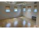 Bright living room featuring hardwood floors, natural light from several windows, and recessed lighting at 3516 Circle Blvd, Indianapolis, IN 46220