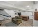 Finished basement with a large recreational area, a sitting area, and a table game at 3535 Birchwood Ave, Indianapolis, IN 46205