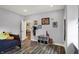 Bedroom featuring hard surface floors and ample space at 3535 Birchwood Ave, Indianapolis, IN 46205