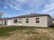 Classic single-story home with attached garage, well-lit by natural light, situated on a tidy lawn at 3540 N Norfolk St, Indianapolis, IN 46224