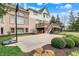 Spacious backyard featuring a basketball court, mature trees, and lush landscaping at 3629 Pete Dye Blvd, Carmel, IN 46033