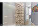 Bright bathroom featuring a white shower and patterned shower curtain at 3629 Pete Dye Blvd, Carmel, IN 46033