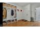 Well-organized mudroom with custom storage, coat hooks, and a convenient entry door at 3629 Pete Dye Blvd, Carmel, IN 46033