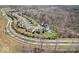 High angle view of a quiet suburban neighborhood with homes surrounding mature trees and lush greenery at 368 Westbrook Ct, Columbus, IN 47201