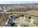 Beautiful aerial view of an upscale neighborhood with well-maintained lawns and mature trees in a serene setting at 368 Westbrook Ct, Columbus, IN 47201