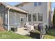 The backyard patio has an outdoor kitchen and sitting area at 368 Westbrook Ct, Columbus, IN 47201