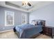 Comfortable bedroom features neutral paint, carpet and two large windows at 368 Westbrook Ct, Columbus, IN 47201