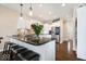Modern kitchen with granite countertops, stainless steel appliances and hardwood flooring at 368 Westbrook Ct, Columbus, IN 47201