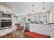 Spacious kitchen adjacent to the living room, featuring modern appliances and an abundance of natural light at 368 Westbrook Ct, Columbus, IN 47201