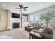 Bright living room featuring a fireplace, large windows, and comfortable seating creating an inviting atmosphere at 368 Westbrook Ct, Columbus, IN 47201