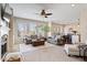 Expansive living room with hardwood flooring, fireplace, and plenty of space for dining and entertaining at 368 Westbrook Ct, Columbus, IN 47201