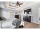 Comfortable main bedroom featuring a decorative tray ceiling and spacious layout at 368 Westbrook Ct, Columbus, IN 47201