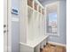 Mudroom boasts built-in storage with baskets and a bench near the entry at 368 Westbrook Ct, Columbus, IN 47201
