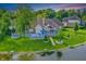 Stunning home with a backyard deck overlooking the lake, offering picturesque views and serene outdoor living at 3862 Penzance Pl, Carmel, IN 46032