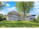 Spacious backyard featuring a large deck, perfect for outdoor entertaining and enjoying the serene surroundings at 3862 Penzance Pl, Carmel, IN 46032