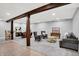 Finished basement features new recessed lighting, game tables, and lounge area at 3862 Penzance Pl, Carmel, IN 46032