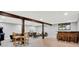Finished basement featuring a bar, game tables, and lounge area with new recessed lighting at 3862 Penzance Pl, Carmel, IN 46032