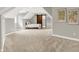 Large bedroom with carpet and wood sliding door and William Morris print wall decorations at 3862 Penzance Pl, Carmel, IN 46032