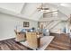 Spacious living room boasts vaulted ceilings, lots of natural light, and hardwood floors at 3862 Penzance Pl, Carmel, IN 46032