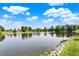 Scenic pond view capturing the tranquility and beauty of the surrounding landscape, great for peaceful contemplation at 3862 Penzance Pl, Carmel, IN 46032