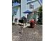 Relaxing patio area with outdoor dining set, barbecue, and lush greenery, ideal for entertaining at 3934 N Lakeside Dr, Muncie, IN 47304