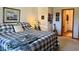 Cozy bedroom with natural light, a comfortable bed, and a connected bathroom at 3934 N Lakeside Dr, Muncie, IN 47304