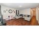 Cozy living room boasts hardwood floors and ample space for relaxation and entertaining at 4414 Lexington Ave, Indianapolis, IN 46203