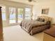 A bedroom with water views and comfortable decor with lake views at 4414 Princeton Park Dr, Columbus, IN 47201