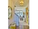 Inviting foyer with tiled floors, a staircase, and views into the living area at 4414 Princeton Park Dr, Columbus, IN 47201