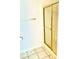 Shower with gold trim and glass door at 4414 Princeton Park Dr, Columbus, IN 47201
