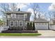 Charming two-story home with second story balcony and detached two-car garage at 4850 Guilford Ave, Indianapolis, IN 46205