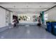 Clean and organized two-car garage with epoxy flooring and ample storage space at 4850 Guilford Ave, Indianapolis, IN 46205