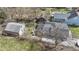 Aerial view of a group of homes, with bare trees, grassy areas, and detached garages on some lots at 5110 Chelsea Rd, Indianapolis, IN 46241