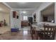 Open-concept dining area with wood floors and a view of the kitchen at 5110 Chelsea Rd, Indianapolis, IN 46241