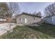 Charming single-story home with a well-maintained lawn and inviting front entrance at 5110 Chelsea Rd, Indianapolis, IN 46241