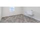 Spacious laundry room featuring tile flooring and a utility sink at 5314 Noble Crossing W Pkwy, Noblesville, IN 46062