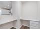 Bright office featuring modern white countertops, storage drawers, and convenient electrical outlets at 5314 Noble Crossing W Pkwy, Noblesville, IN 46062