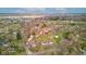 A bird's eye view of a neighborhood, revealing a mix of residential properties with spacious lawns and nearby amenities at 5902 Sunset Dr, Indianapolis, IN 46239