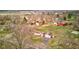 Aerial view of a property showcasing mature trees, surrounding homes, and neighborhood at 5902 Sunset Dr, Indianapolis, IN 46239