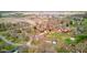 Panoramic aerial view showcasing a tranquil community of houses, close to the convenience of schools and local sports facilities at 5902 Sunset Dr, Indianapolis, IN 46239