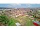 Expansive aerial view of property featuring a large lot, basketball court and proximity to a nearby highway at 5902 Sunset Dr, Indianapolis, IN 46239