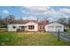 Lovely single-Gathering home with an attached garage, covered porch, and welcoming curb appeal at 5902 Sunset Dr, Indianapolis, IN 46239