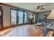 Comfortable living room with large windows and an inviting view of the home's exterior at 5902 Sunset Dr, Indianapolis, IN 46239